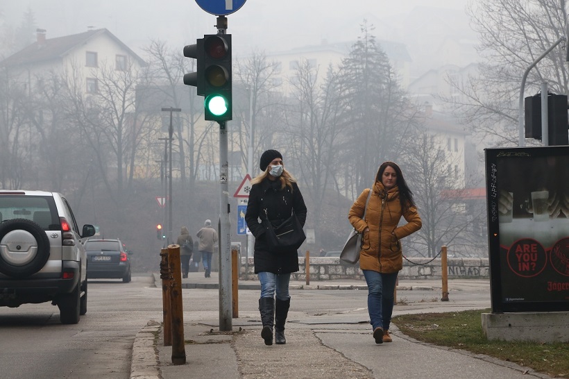 Air Pollution: People walk on the streets of Sarajevo - the capital of Bosnia and Herzegovina wearing masks so as to avoid breathing polluted air. (File Photo: Xinhua/Haris Memija/IANS)