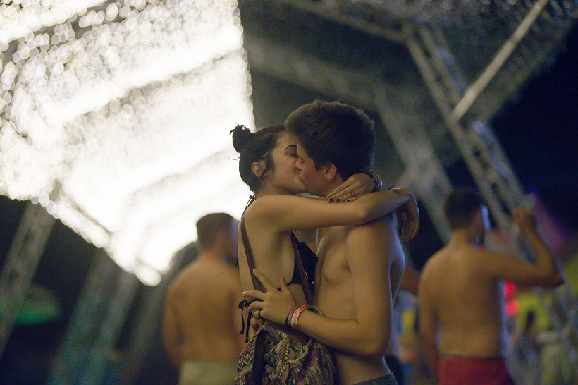  A couple kisses during the Sziget (Hungarian for "Island") Festival on the Obuda Island in Budapest, Hungary (Xinhua/Attila Volgyi)