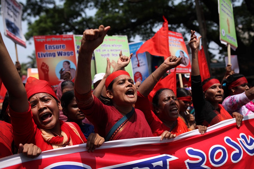 Bangladeshi garment workers march during a procession to mark the International Labor Day in Dhaka, Bangladesh, May 1, 2016. (Xinhua)
