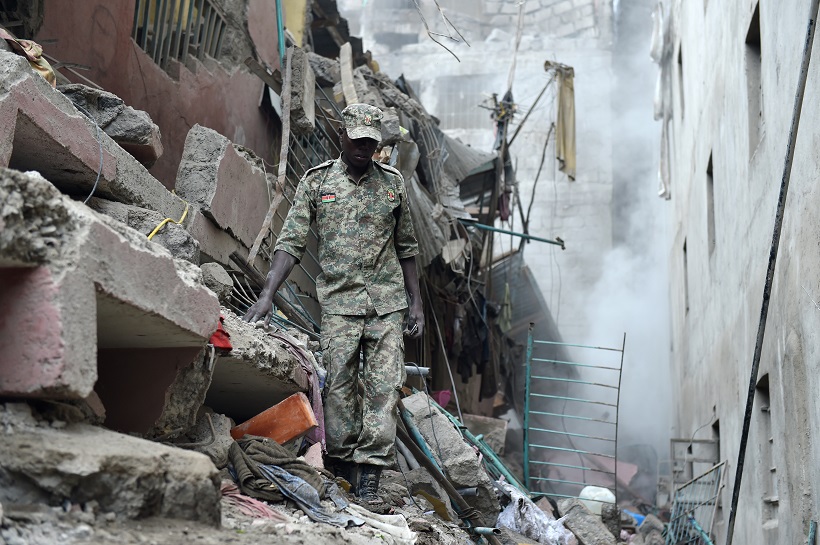 A rescuer works at the site of a building collapse in Nairobi, Kenya (File Photo : Xinhua/Sun Ruibo)