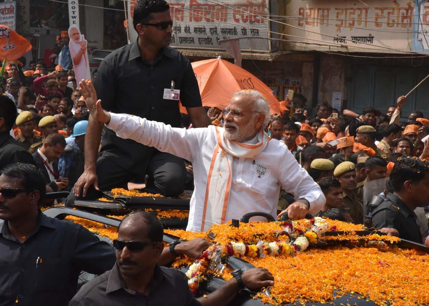 Prime Minister Narendra Modi during a roadshow in Varanasi on March 4, 2017. (Photo: IANS)